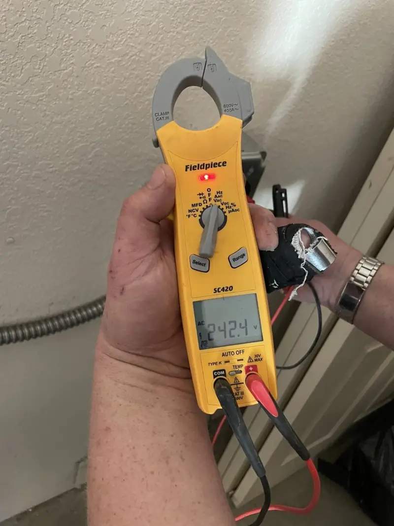 Voltage testing with clamp meter during Aluminum Wiring Replacement in Carthage